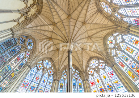 Explore the stunning vaulted ceiling and ornate stained glass windows of the Chapter House at Westminster Abbey in London, showcasing intricate Gothic design and historical significance. Explore the stunning vaulted ceiling and ornate stained glass windows of the Chapter House at Westminster Abbey in London, showcasing intricate Gothic design and historical significance. 125615136