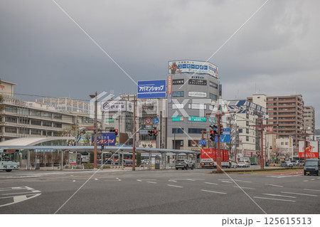 March 24 2025 City Intersection with Tall Buildings and Ferris Wheel in Urban Downtown, Japan 125615513