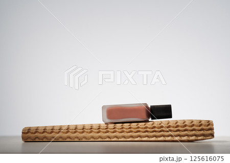 Blank beauty product in recycled delivery packaging. Minimalist mockup 125616075