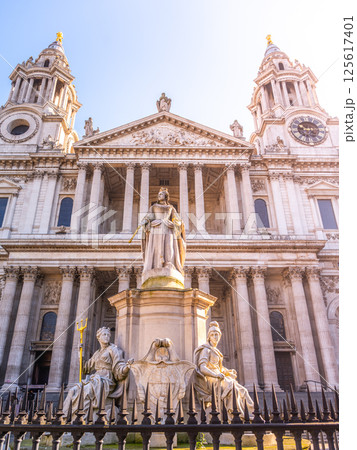 Queen Anne's statue is located at St. Paul's Cathedral in London. The intricate sculpture showcases her regality against the majestic backdrop of the cathedral's architecture. 125617401