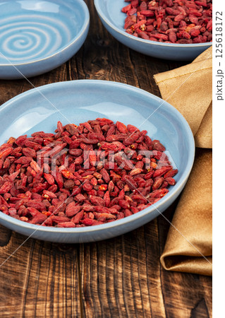 Pile of Dried goji berries. 125618172