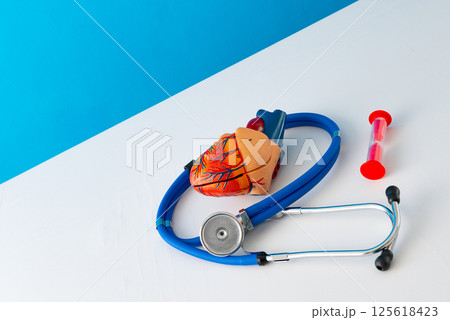 Healthcare and medical concept human heart and hourglass Healthcare and medical concept human heart and hourglass 125618423