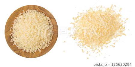 grated parmesan cheese in wooden bowl and scoop isolated on white background. Top view. Flat lay 125620294