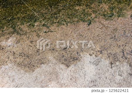 Wet cement surface art retro closeup 125622421