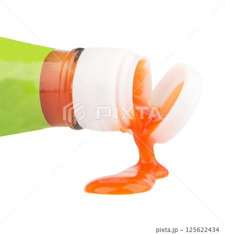 Chili sauce bottle spilled on white background 125622434