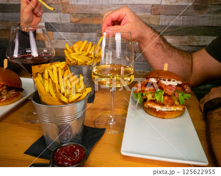 Gourmet Burger Dinner with Wine and Fries Gourmet Burger Dinner with Wine and Fries 125622955