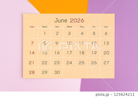 June 2026 calendar brown paper page on purple background. 125624211