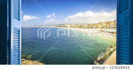room with open door to seascape 125626658