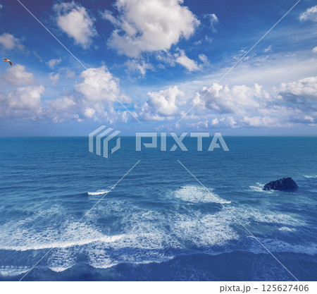 Seascape on a sunny day. View from above Seascape on a sunny day. View from above 125627406