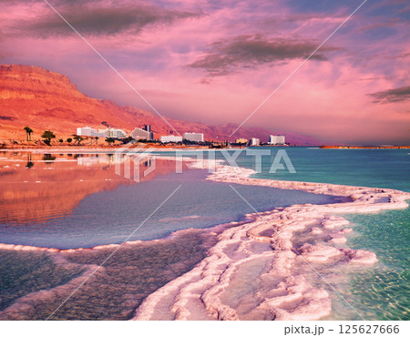 Seascape in the morning. Pink sunrise over the Dead Sea. Seascape in the morning. Pink sunrise over the Dead Sea. 125627666