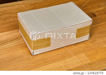 Cardboard Box on Desk 125628774