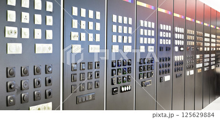 Light switches and sockets in store Light switches and sockets in store 125629884
