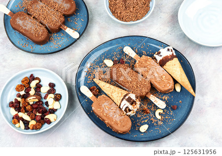 Assorted ice creams on stick. Assorted ice creams on stick. 125631956