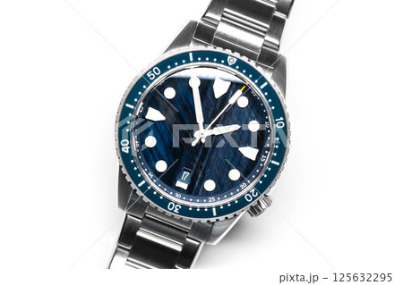 Stylish dive watch featuring a striking blue patterned stone dial in steel case 125632295