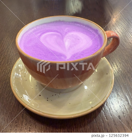 Hot latte with cream 125632394