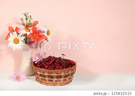 Summer cherry berries in baskets on a sunny background with daisies,wild flowers, harvesting in the village, the concept of healthy natural food, breakfast with ingredients, shop advertising, cafe Summer cherry berries in baskets on a sunny background with daisies,wild flowers, harvesting in the village, the concept of healthy natural food, breakfast with ingredients, shop advertising, cafe 125632515