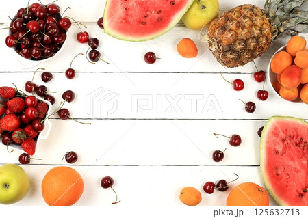 Summer berries and fruits on wooden background, healthy natural food concept, breakfast with ingredients, top view, advertisement for a store, business card for a cafe, invitation with place for text, Summer berries and fruits on wooden background, healthy natural food concept, breakfast with ingredients, top view, advertisement for a store, business card for a cafe, invitation with place for text, 125632713