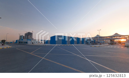 Sunset at free zone of Ajman timelapse. Ajman is the capital of the emirate of Ajman in the United Arab Emirates. 125632813