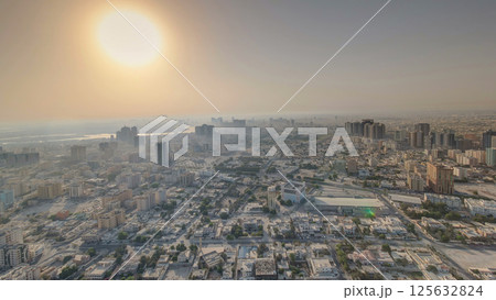 Cityscape of Ajman from rooftop during the morning after sunrise timelapse. 125632824