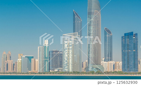 View of high skyscrapers on a corniche in Abu Dhabi stretching alongside the business center timelapse hyperlapse. 125632930