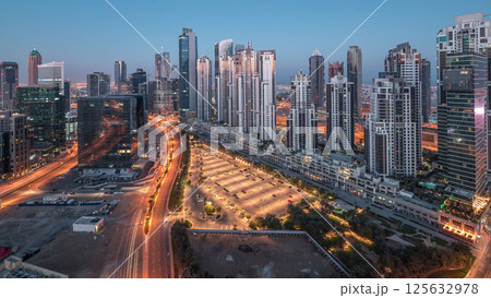 Panorama of Business bay Dubai night to day aerial timelapse. Panorama of Business bay Dubai night to day aerial timelapse. 125632978