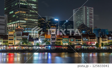 Singapore quay with tall skyscrapers in the central business district on Boat Quay night timelapse hyperlapse Singapore quay with tall skyscrapers in the central business district on Boat Quay night timelapse hyperlapse 125633041