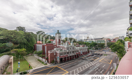 Street traffic near the fire station of Singapore aerial timelapse. Street traffic near the fire station of Singapore aerial timelapse. 125633057