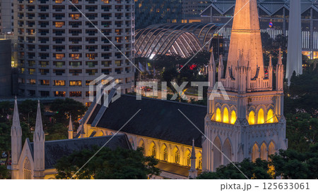St. Andrew's Cathedral aerial day to night timelapse. It is an Anglican cathedral in Singapore, the country's largest cathedral. St. Andrew's Cathedral aerial day to night timelapse. It is an Anglican cathedral in Singapore, the country's largest cathedral. 125633061