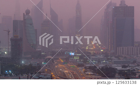 Dubai cityscape during sand storm day to night timelapse Dubai cityscape during sand storm day to night timelapse 125633138
