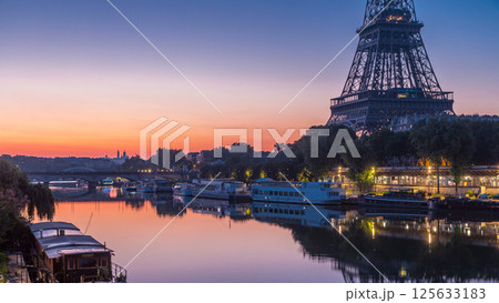 Eiffel Tower and the Seine river night to day timelapse, Paris, France Eiffel Tower and the Seine river night to day timelapse, Paris, France 125633183