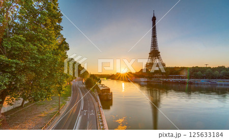 Eiffel Tower and the Seine river at Sunrise timelapse, Paris, France 125633184