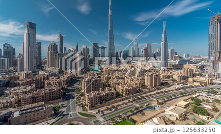 Dubai Downtown skyline timelapse with Burj Khalifa and other towers panoramic view from the top in Dubai Dubai Downtown skyline timelapse with Burj Khalifa and other towers panoramic view from the top in Dubai 125633250