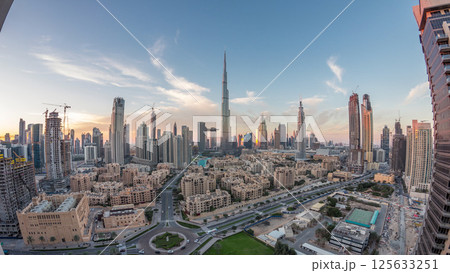 Dubai Downtown skyline day to night timelapse with Burj Khalifa and other towers panoramic view from the top in Dubai Dubai Downtown skyline day to night timelapse with Burj Khalifa and other towers panoramic view from the top in Dubai 125633251