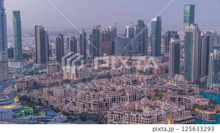 Dubai downtown night to day timelapse. Top view from above Dubai downtown night to day timelapse. Top view from above 125633293