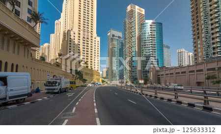 A view of traffic on the street at Jumeirah Beach Residence and Dubai marina timelapse hyperlapse, United Arab Emirates. 125633312