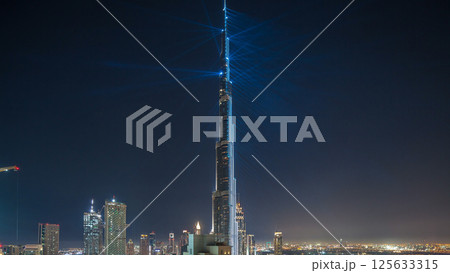 Dubai downtown cityscape with Burj Khalifa, LightUp light show aerial timelapse Dubai downtown cityscape with Burj Khalifa, LightUp light show aerial timelapse 125633315