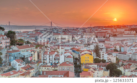 Lisbon at sunset aerial panoramic view of city centre with red roofs at autumn evening timelapse, Portugal 125633371