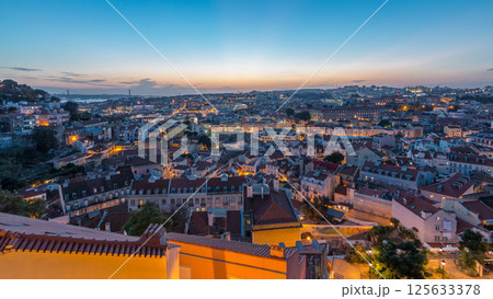 Lisbon panorama after sunset aerial view of city centre with red roofs at autumn day to night timelapse, Portugal 125633378