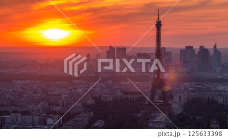 Panorama of Paris at sunset timelapse. Eiffel tower view from montparnasse building in Paris - France Panorama of Paris at sunset timelapse. Eiffel tower view from montparnasse building in Paris - France 125633398