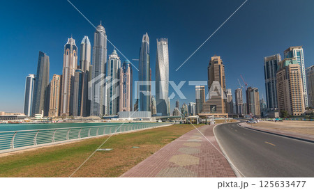 Scenic view of Dubai Marina Skyscrapers with boats timelapse hyperlapse, Skyline, View from sea, United Arab Emirates 125633477