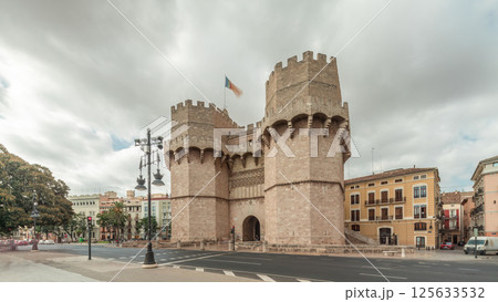 Serrans Towers or Torres de Serranos timelapse hyperlapse in Valencia, Spain. Serrans Towers or Torres de Serranos timelapse hyperlapse in Valencia, Spain. 125633532