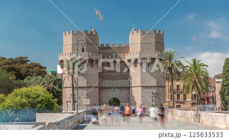 Serrans Towers or Torres de Serranos timelapse hyperlapse in Valencia, Spain. Serrans Towers or Torres de Serranos timelapse hyperlapse in Valencia, Spain. 125633533