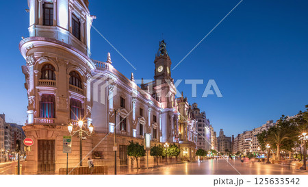 Valencia City Hall or Ajuntament de Valencia day to night timelapse hyperlapse in Plaza de Ayuntamiento. Spain 125633542