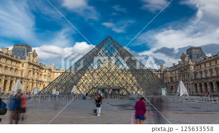 Large glass pyramid and the main courtyard of the Louvre Museum timelapse hyperlapse. Paris, France 125633558