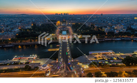Aerial view over Trocadero day to night timelapse with the Palais de Chaillot seen from the Eiffel Tower in Paris, France. 125633577