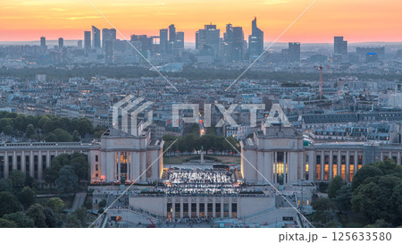 Aerial view over Trocadero day to night timelapse with the Palais de Chaillot seen from the Eiffel Tower in Paris, France. 125633580