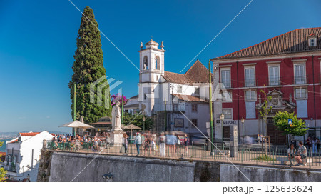 Sculpture of Sao Vicente timelapse hyperlapse, Lisbon's Patron Saint at Largo De Santa Luzia with church. Lisbon, Portugal Sculpture of Sao Vicente timelapse hyperlapse, Lisbon's Patron Saint at Largo De Santa Luzia with church. Lisbon, Portugal 125633624