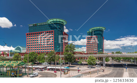 Aerial timelapse hyperlapse of Centro Colombo and modern office buildings in Lisbon. Portugal. Aerial timelapse hyperlapse of Centro Colombo and modern office buildings in Lisbon. Portugal. 125633630