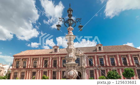 Archbishop Palace of Seville and Fuente Farola Fountain on Plaza de Virgen de los Reyes timelapse 125633681