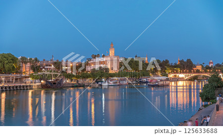 Torre del Oro day to night timelapse on Guadalquivir River in Seville, Spain Torre del Oro day to night timelapse on Guadalquivir River in Seville, Spain 125633688